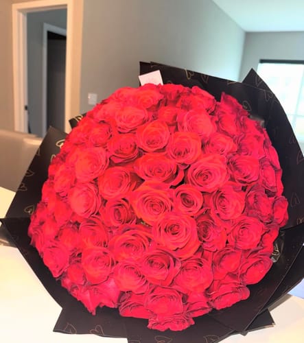 Customer photo review of 100 Red Rose Bouquet
