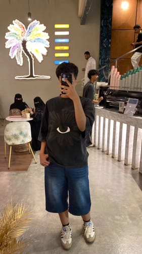 Customer photo review of "The Eye" Tee