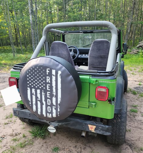 Customer photo review of Freedom - American Flag Spare Tire Cover for Jeep, Bronco, RV, Camper, & More