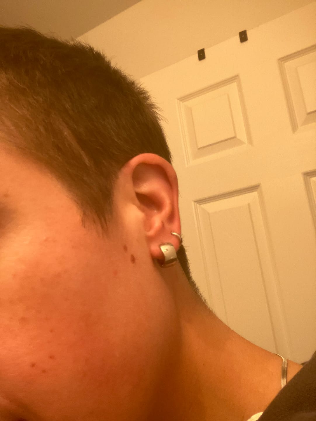 Customer photo review of Ash Micro Huggie Hoop Earrings
