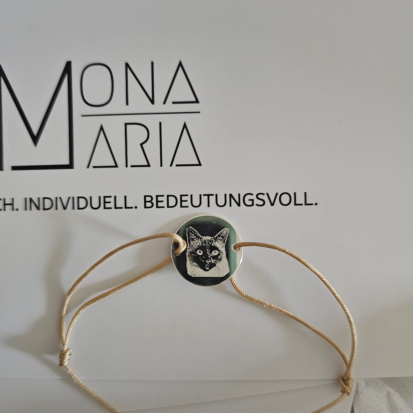 Customer photo review of MONA MARIA ARMBAND TEXTIL MIT FOTO