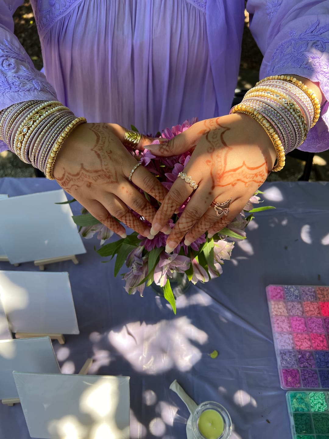 Customer photo review of LIGHT PURPLE  AND PEARL WHITE  BANGLE WITH KUNDAN ACCENTS - 2 HAND SET