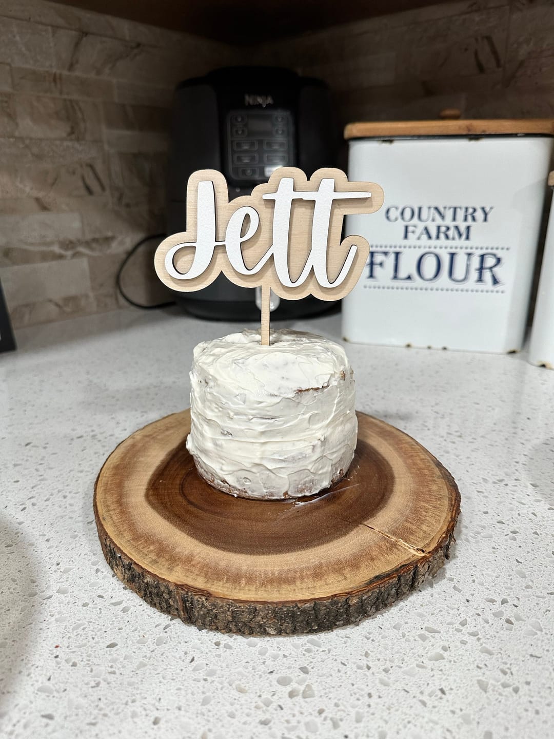 Customer photo review of Name Cake Topper