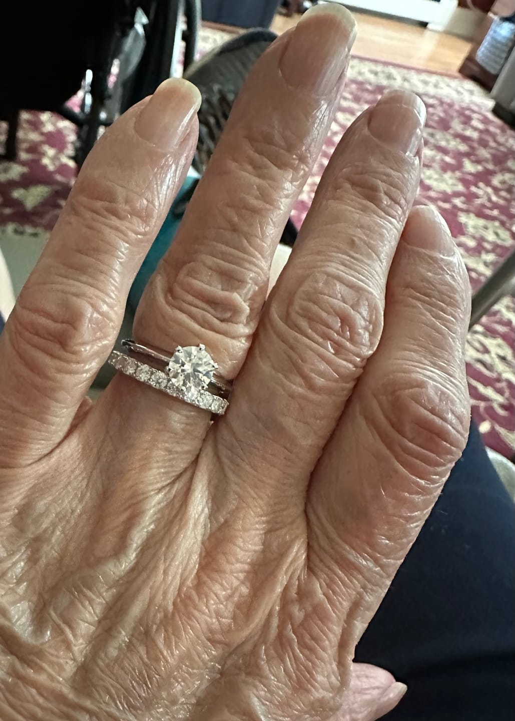 Customer photo review of Classic Solitaire Moissanite Six-Prong Sterling Silver Engagement Ring