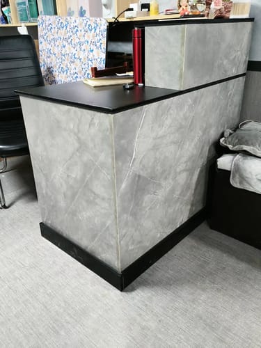 Customer photo review of Minimalist Modern Functional Reception Desk with Thick Tabletop