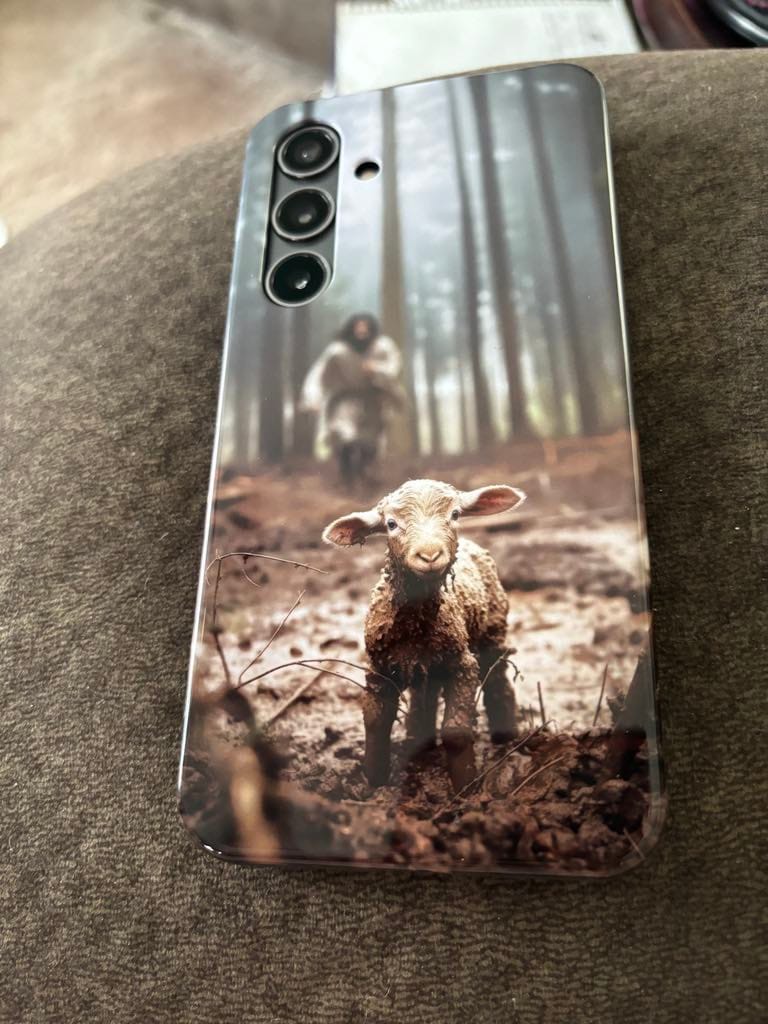 Customer photo review of Jesus With The Sheep, Jesus Running After Lamb, Phone Case