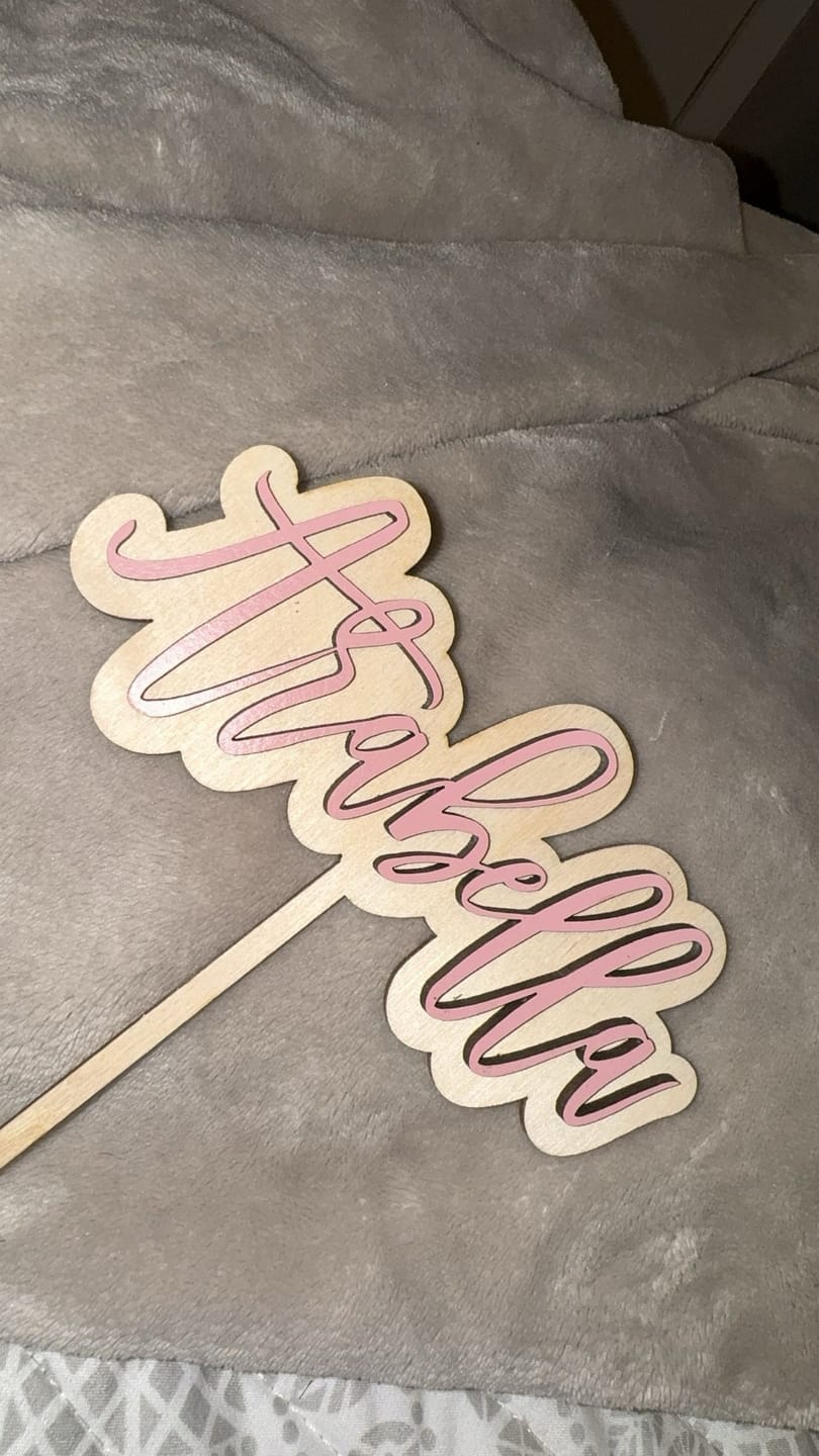Customer photo review of Name Cake Topper