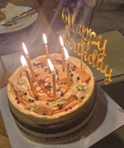 Customer photo review of chocolate caramel cake