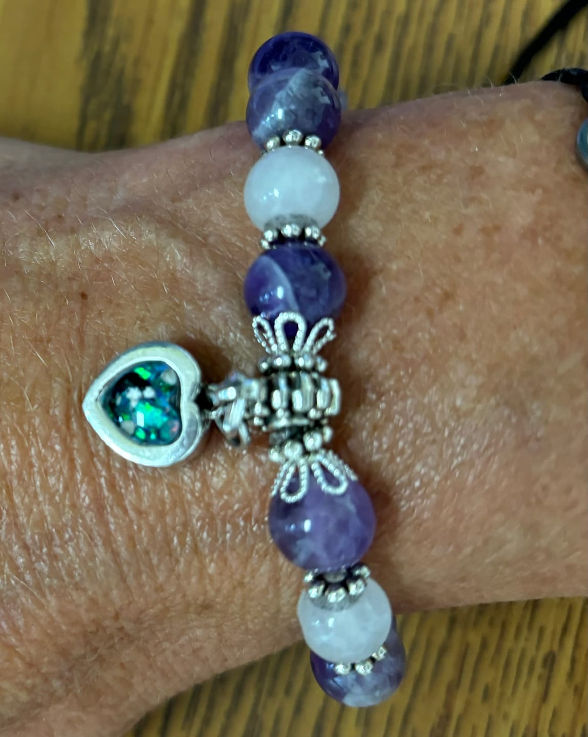 Customer photo review of Amethyst and Rose Quartz Healing Bracelet with Cremation Ashes