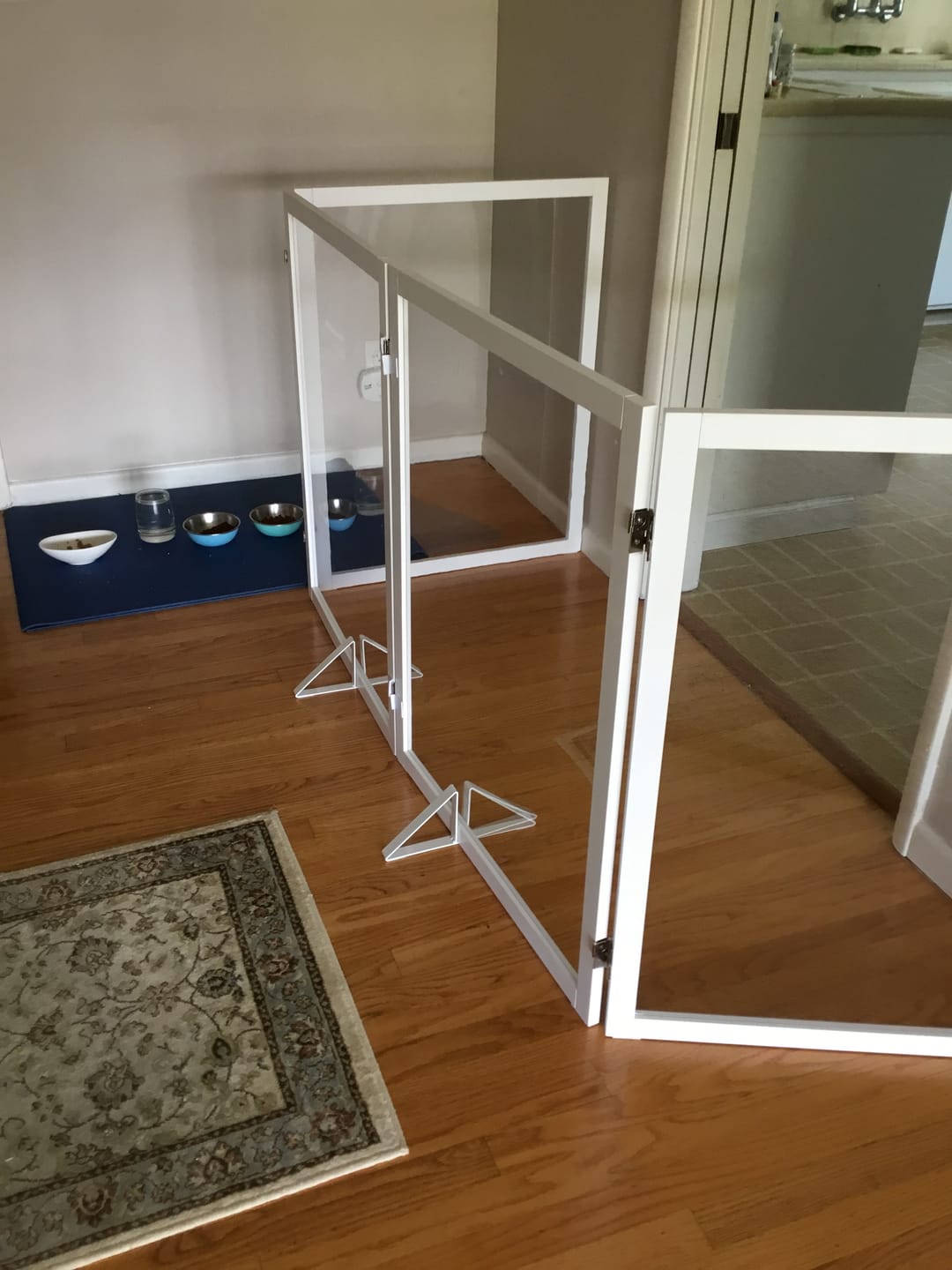 Customer photo review of FairyBaby Clear Freestanding Foldable Dog Gate