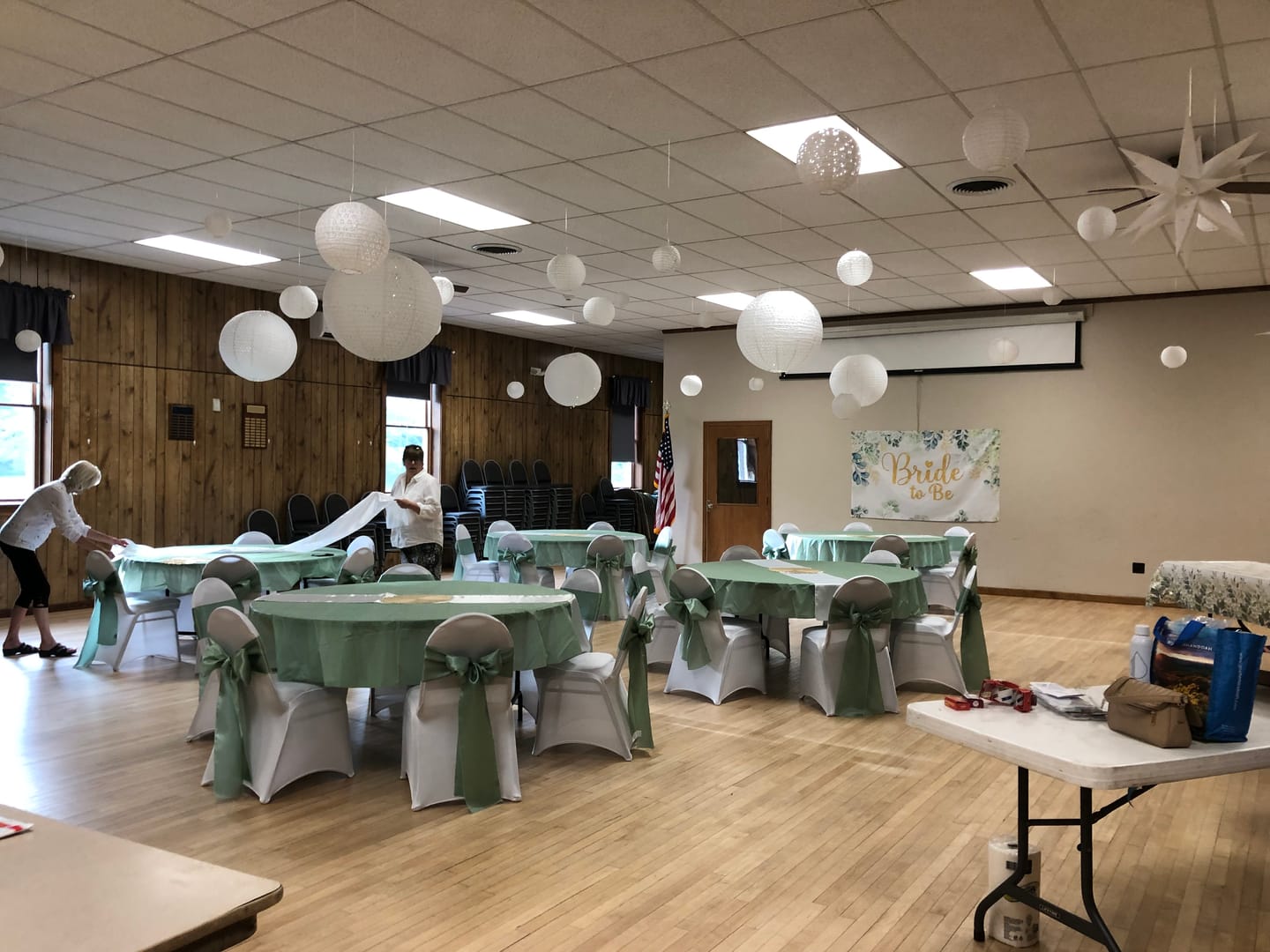 Customer photo review of 6/8/10" White Eyelet Lace Look Round Paper Lanterns, Even Ribbing (3-Pack Cluster)