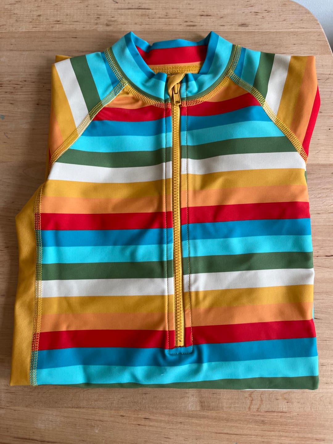 Customer photo review of Rainbow UPF 50+ Recycled Sunsafe Sunsuit
