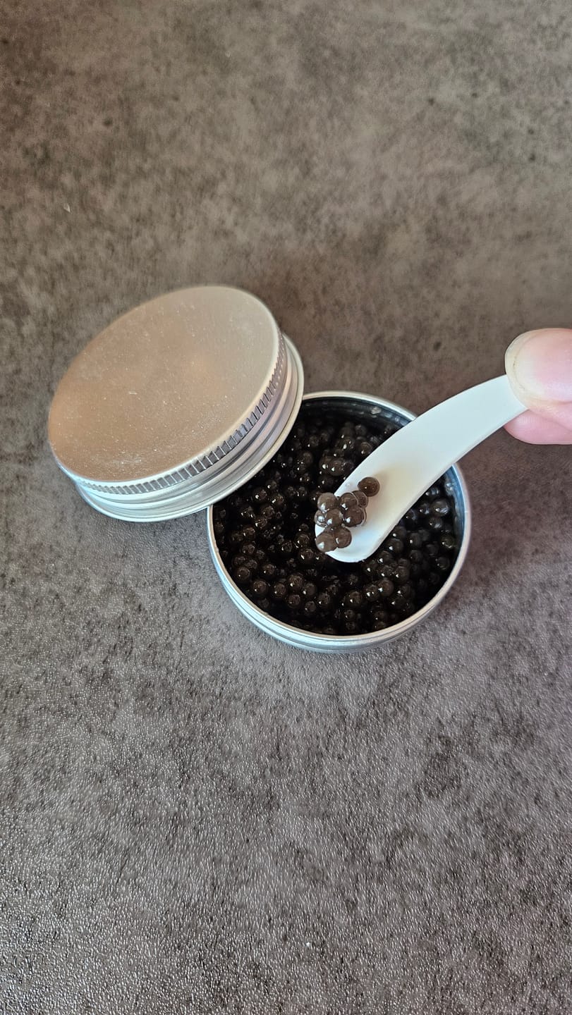 Customer photo review of Caviar Essence Face Serum
