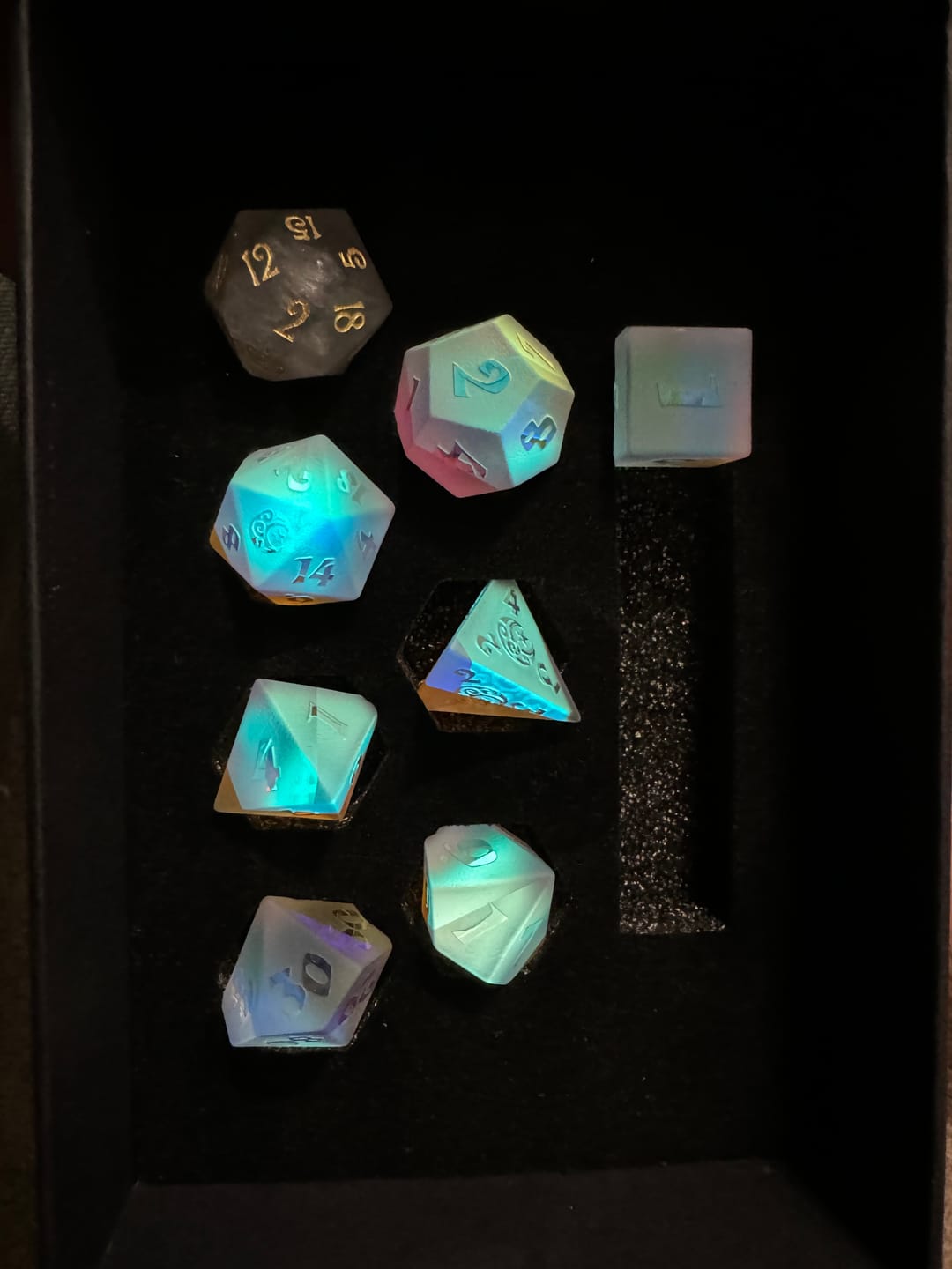 Customer photo review of URWizards D&D Dichroic Prism  Glass Raised Dice Set Moon & Star