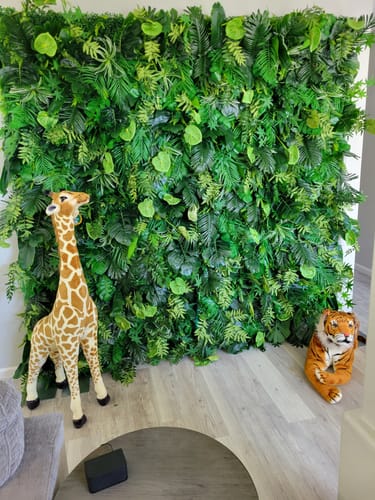 Customer photo review of Green Tropical Jungle Fabric Artificial Flower Wall Backdrop Party Decor