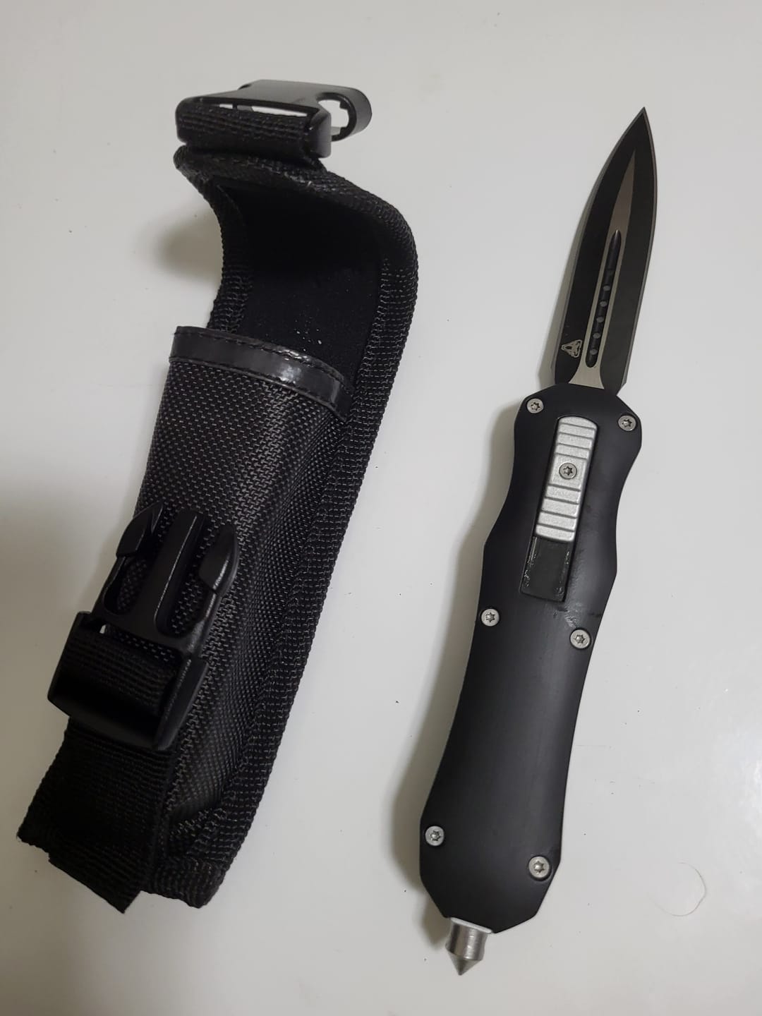 Customer photo review of Black Reaper OTF Knife