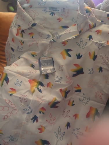 Customer photo review of Dinosaur Footprints Rainbow Button Up Shirt