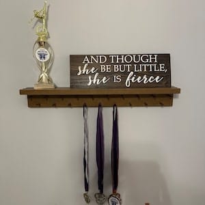 Customer photo review of 4ft Medal Awards Rack Premier Trophy Shelf- Trophy, Plaque and Medal Display