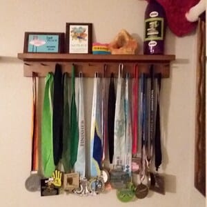 Customer photo review of 2ft Medal Awards Rack Premier Trophy Shelf- Trophy, Plaque and Medal Display