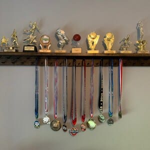 Customer photo review of 4ft Medal Awards Rack Premier Trophy Shelf- Trophy, Plaque and Medal Display
