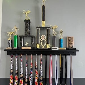 Customer photo review of 4ft Medal Awards Rack Premier Trophy Shelf- Trophy, Plaque and Medal Display