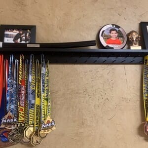 Customer photo review of 4ft Medal Awards Rack Premier Trophy Shelf- Trophy, Plaque and Medal Display