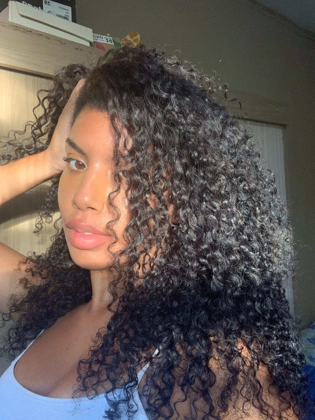Customer photo review of JYZ Deep Wave Tape in Hair Extensions Natural Tape on Hair Extensions Jet Black Real Human Hair Invisible Tape Hair for Women