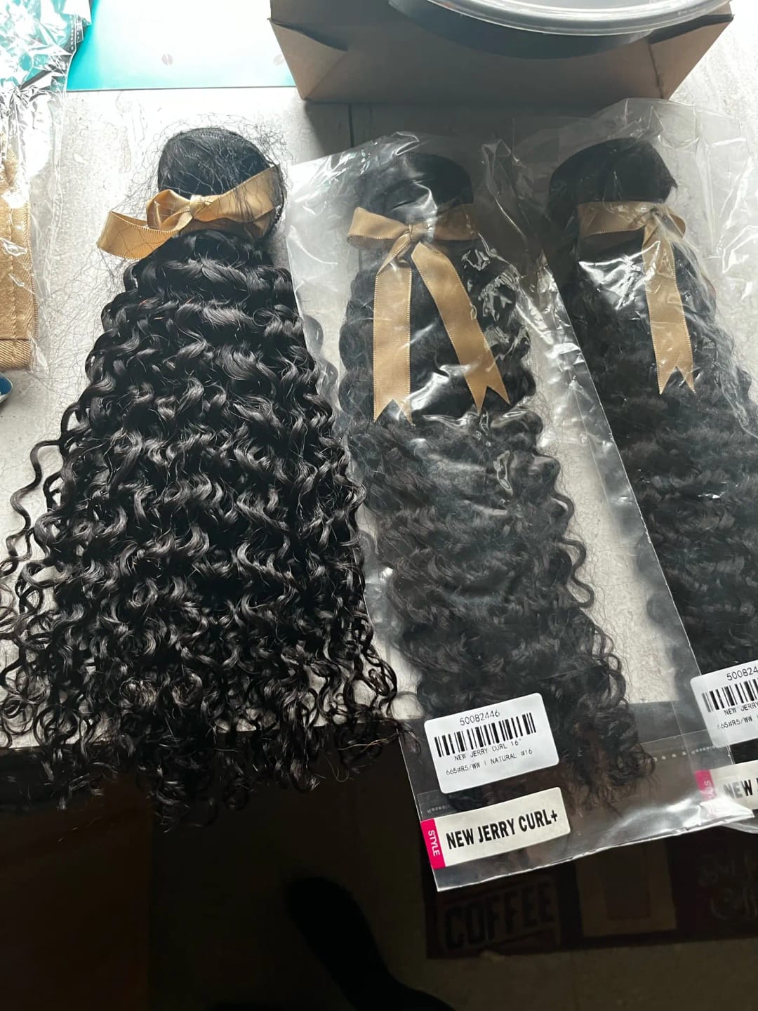 Customer photo review of JYZ Deep Wave Tape in Hair Extensions Natural Tape on Hair Extensions Jet Black Real Human Hair Invisible Tape Hair for Women