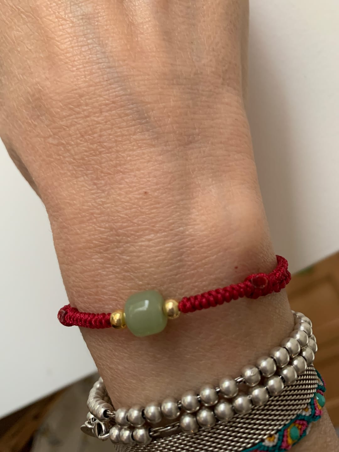Customer photo review of Buddha Stones Handmade Jade Lucky Bead Prosperity Braided Bracelet