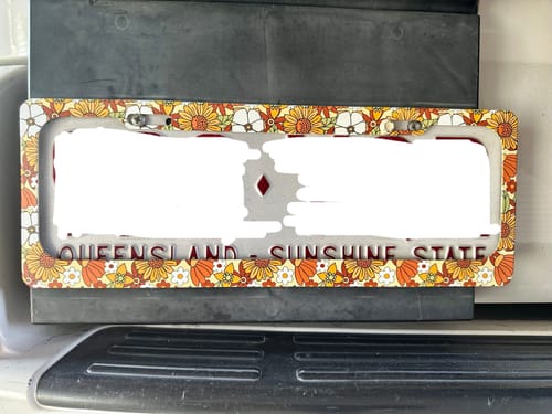 Customer photo review of Rustic Blooms License Plate Frame