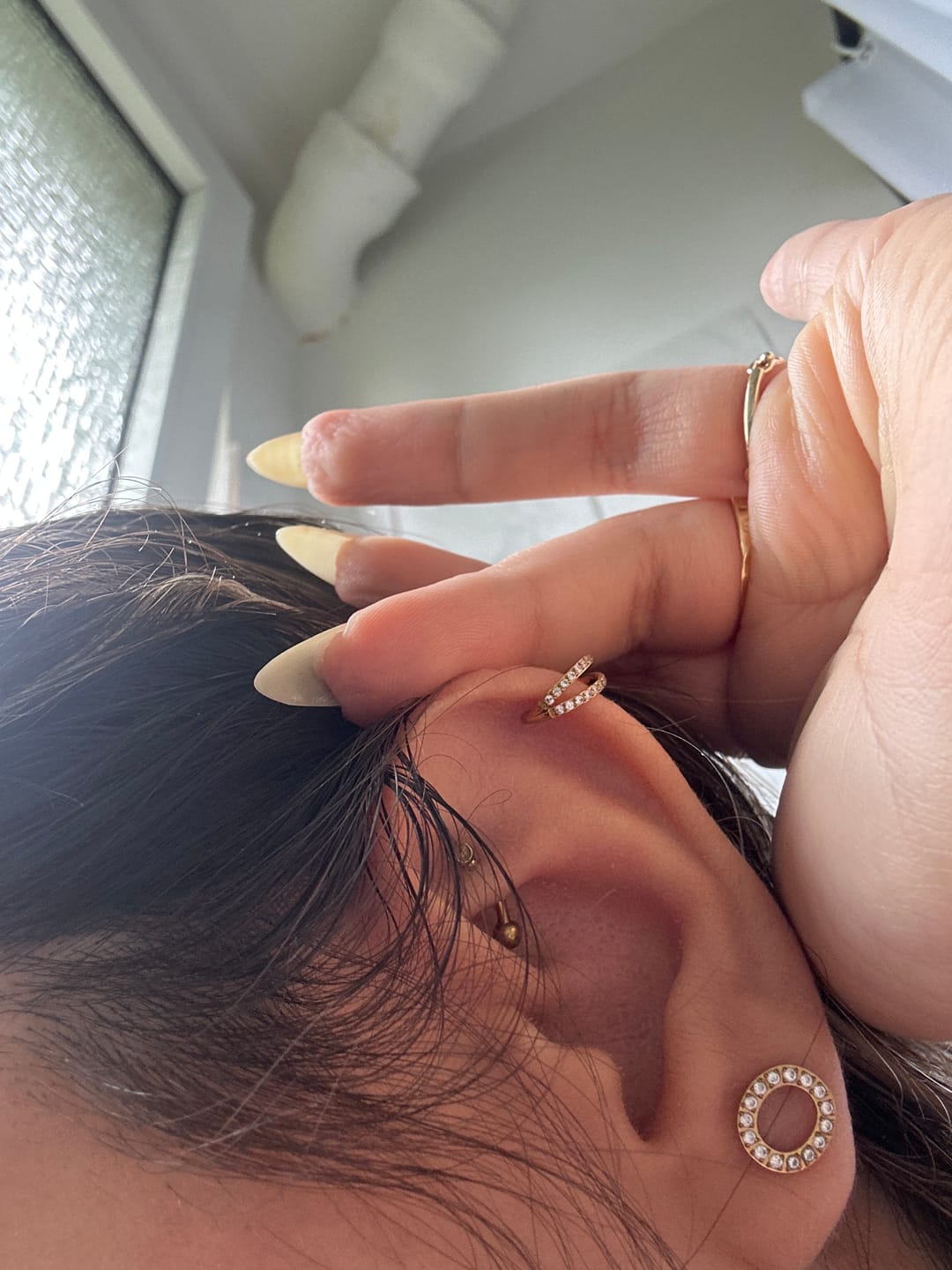 Customer photo review of Double Clicker Piercing | Titan