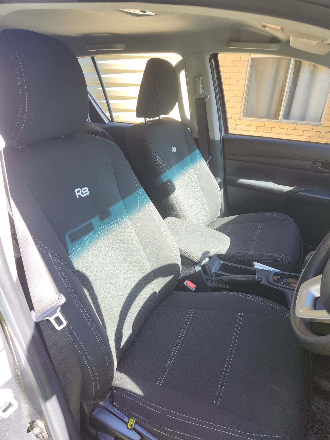 Customer photo review of Toyota HiLux 8th Gen SR Premium Neoprene 2x Front Seat Covers (Available)