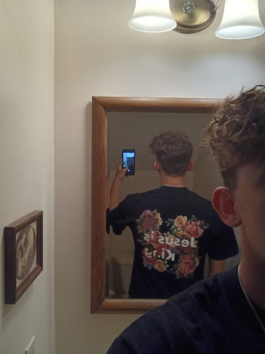 Customer photo review of Jesus Is King Tee