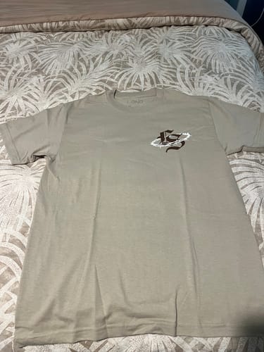 Customer photo review of Razor Edge Tee
