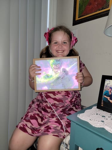 Customer photo review of O.P Series LED Light Painting Anime Photo Frame Wall Art