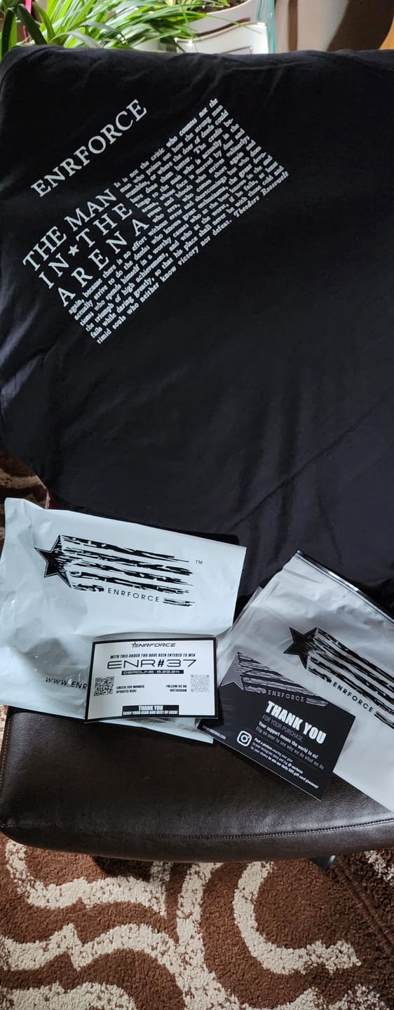 Customer photo review of Man in The Arena Tee