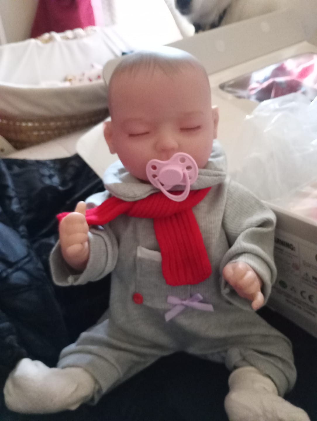 Customer photo review of Theo -  Lifelike Sleeping Reborn Baby Doll (18")