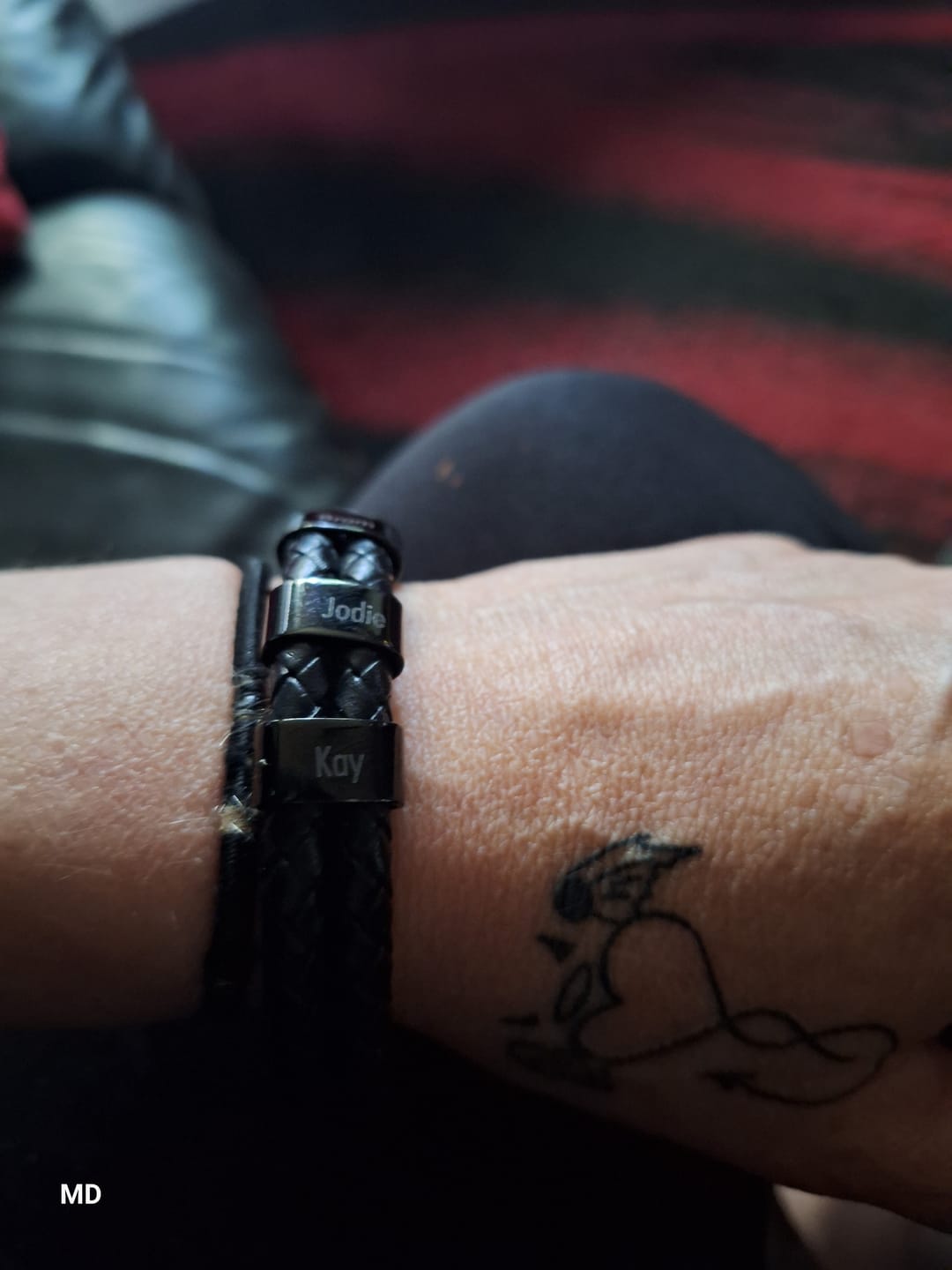 Customer photo review of Familieband - Gepersonaliseerde leren armband met ringen en namen