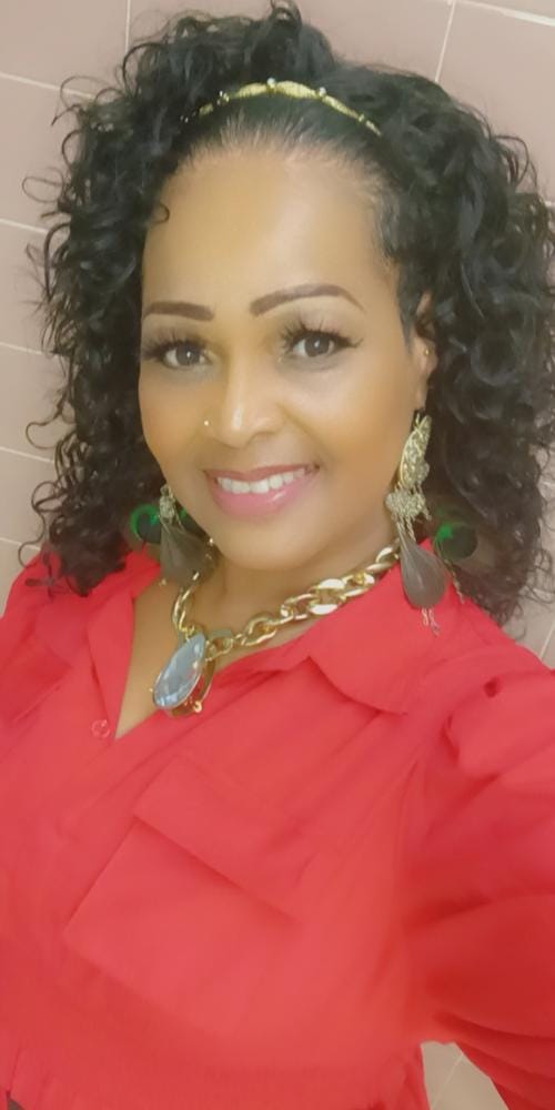 Customer photo review of Outre Quick Weave Half Wig AMBER