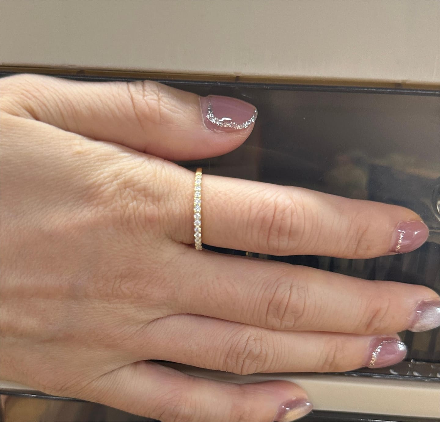 Customer photo review of S925 Moissanite 0.5 CT Round Cut Half Eternity Thin Women's Wedding Band Stackable Ring