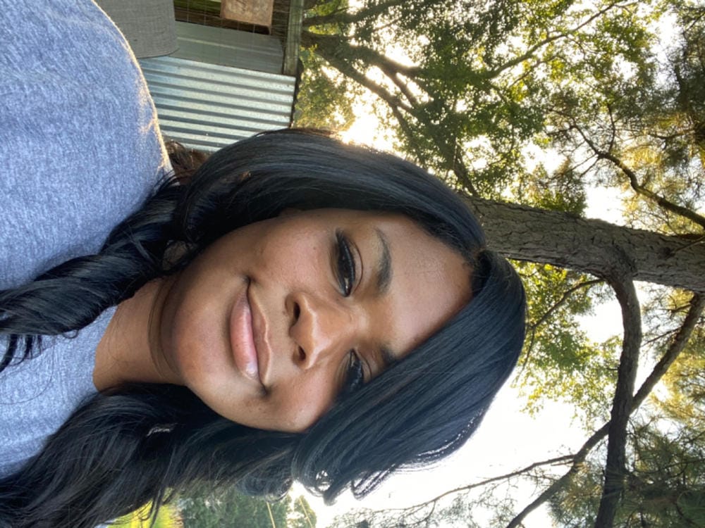 Customer photo review of Freetress Equal Brazilian Natural Synthetic Lace Front Invisible L Part Wig DANITY