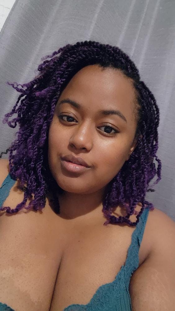 Customer photo review of Outre X-Pression Twisted Up Crochet Braid - 3X SPRINGY AFRO TWIST 16"