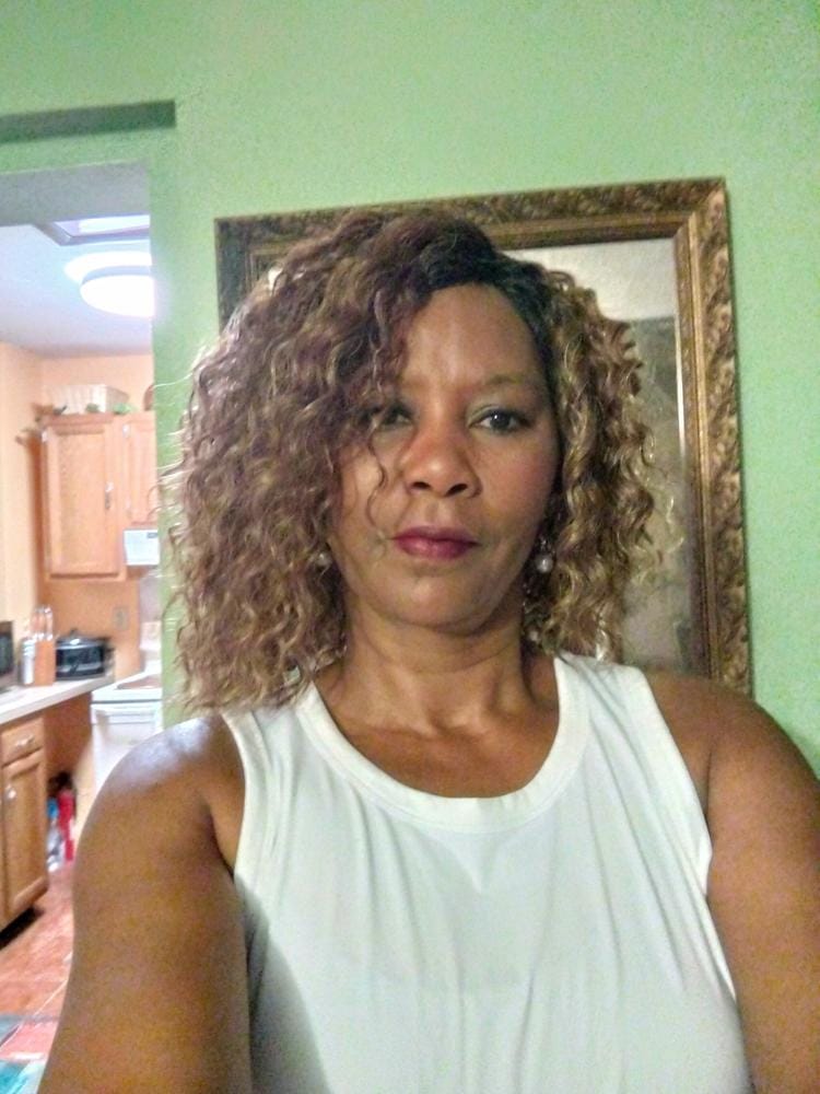 Customer photo review of Outre Synthetic Pre-Plucked HD Transparent Lace Front Wig- GRETA