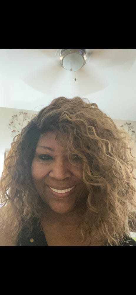 Customer photo review of Outre Synthetic Pre-Plucked HD Transparent Lace Front Wig- GRETA