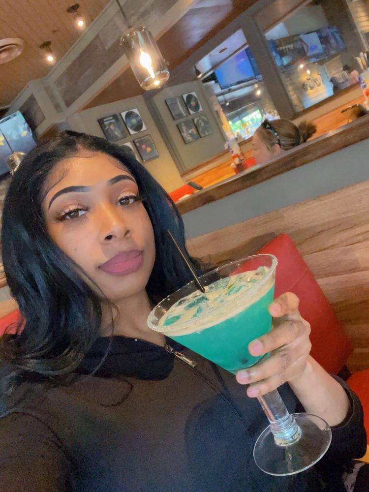 Customer photo review of Outre Synthetic Melted Hairline Lace Front Wig SERAPHINE