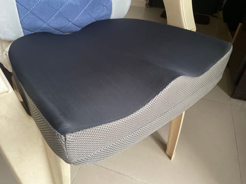 Customer photo review of Orthopaedic Coccyx Cushion Seat | For Lower Back & Tailbone Pain Reliever | Useful on a Car Seat / Office Chair (Grey)