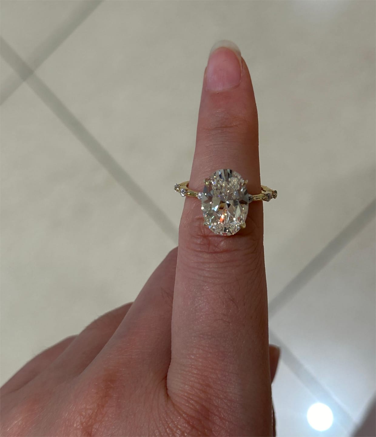 Customer photo review of S925 Yellow Gold 5.5Ct Oval Cut Engagement Ring In Sterling Silver