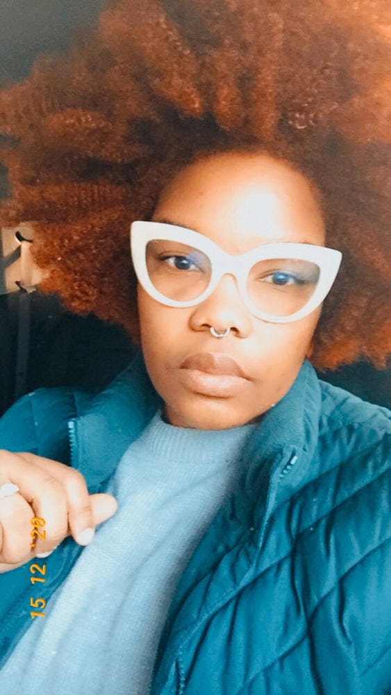 Customer photo review of Outre X-Pression Twisted Up Crochet Braid - 3X SPRINGY AFRO TWIST 16"