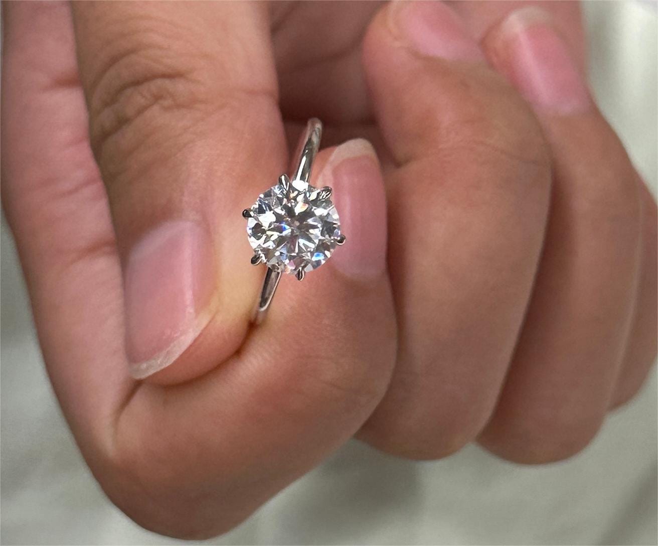 Customer photo review of S925 2.0 Carat Moissanite 6 Prong Round Cut Promise Ring