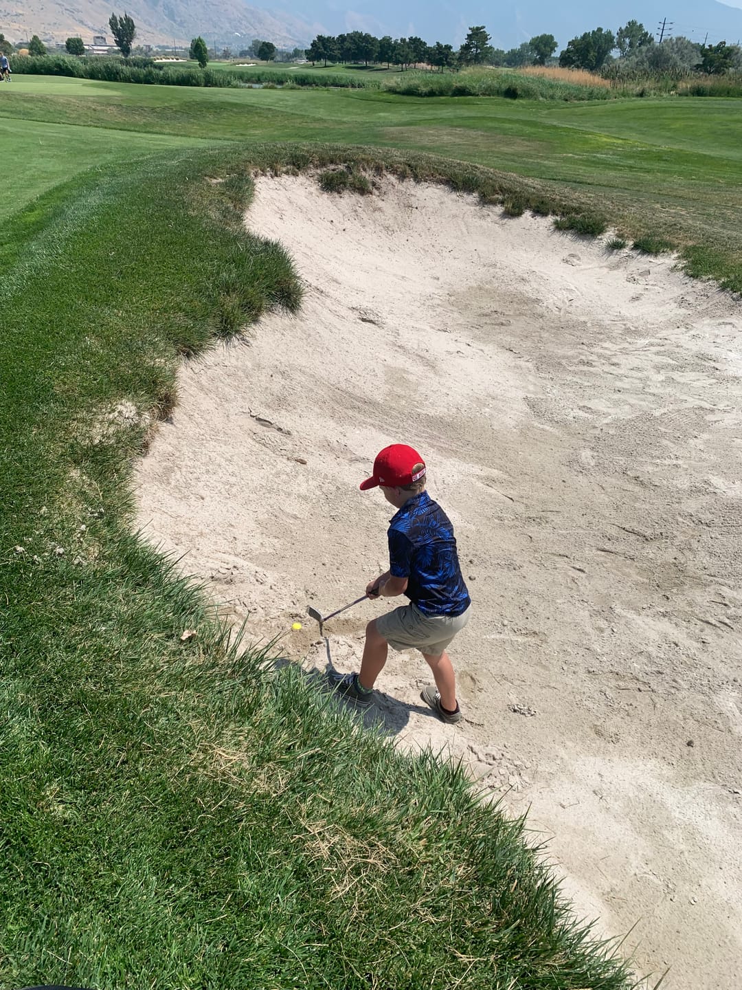 Customer photo review of Midnight Blue Youth Golf Polo